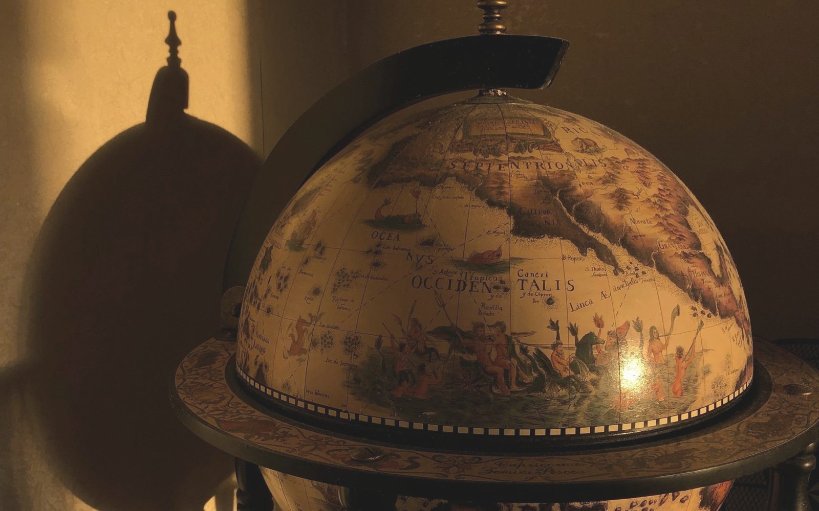 An antique globe in warm light.